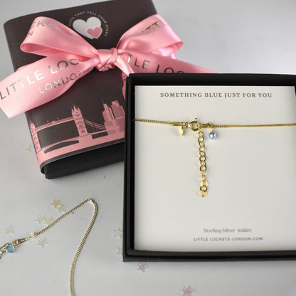 Gold plated version shown gift box and with optional skyline wrap and ribbon in the background.