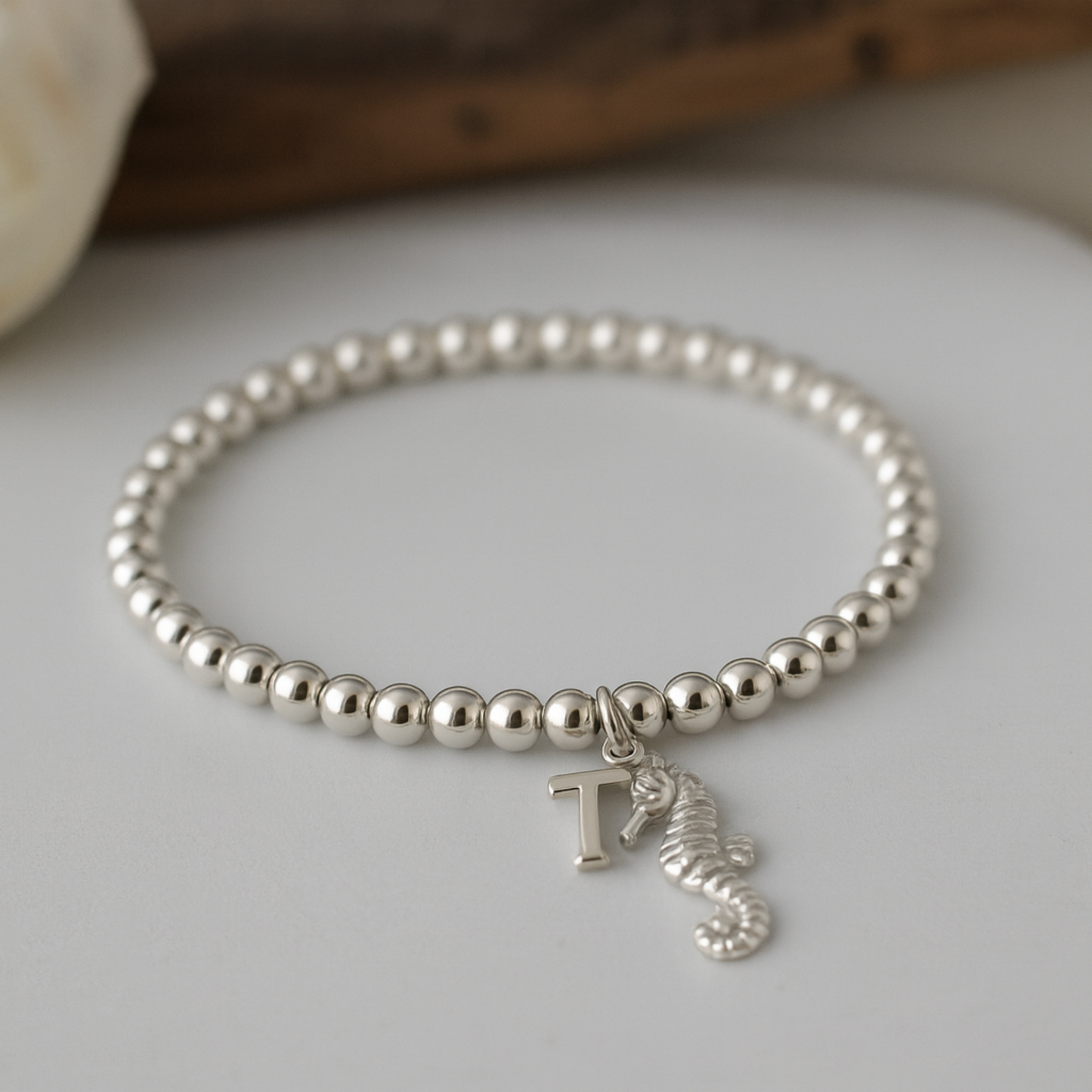 Sterling silver beaded bracelet with sterling silver seahorse charm and optional initial