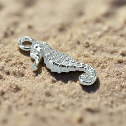 Our pretty seahorse charm shown in sterling silver