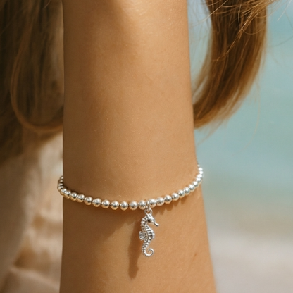 Sterling silver beaded bracelet with sterling silver seahorse charm