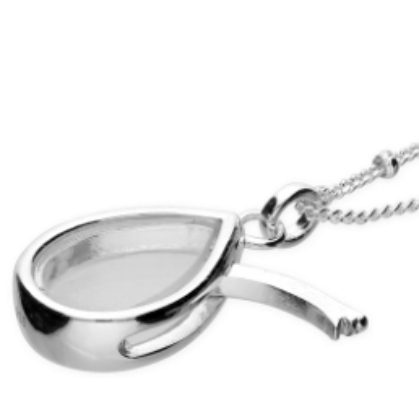 Sterling silver glass locket shown with side opening to insert charms or tiny crystals.