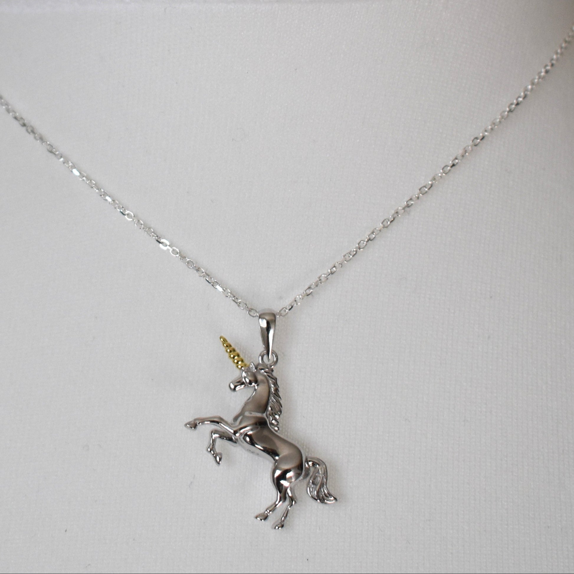 Silver unicorn pendant necklace on a 14" sterling silver chain