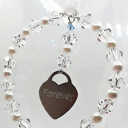 Personalised wedding bouquet charm with engraved silver heart, crystals, pearls, and 'Something Blue' bead. The heart can be engraved with wording of your choice
