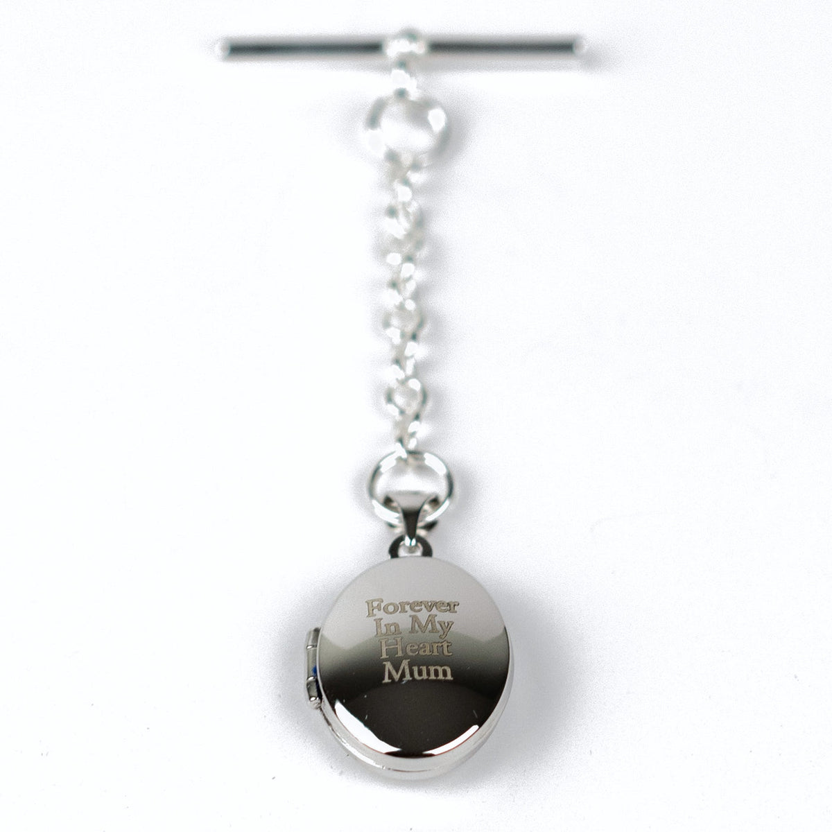 Sterling silver locket engraved with the message of your choice, shown with t-bar fastening
