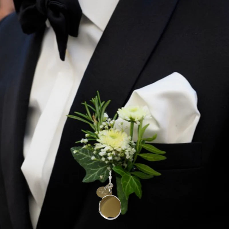 Sterling silver locket on groom's lapel with engraved sterling silver tag "Dad"