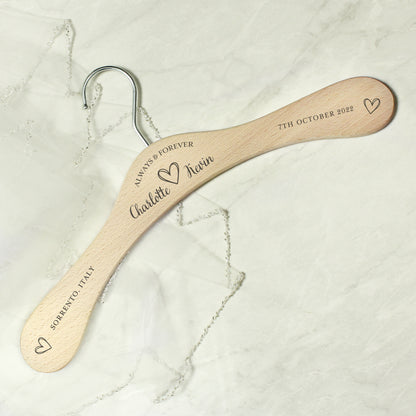 personalised wooden wedding hanger with Bride & Groom's names under the words "Always and Forever" and with a pretty sketched heart between the names. Room for further personalisation on each arm of the hanger.