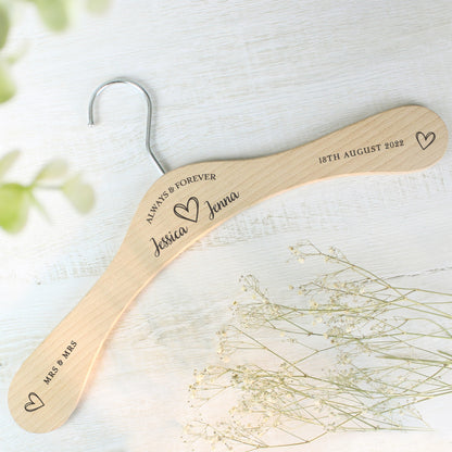personalised wooden wedding hanger with Bride & Groom's names under the words "Always and Forever" and with a pretty sketched heart between the names. Room for further personalisation on each arm of the hanger.
