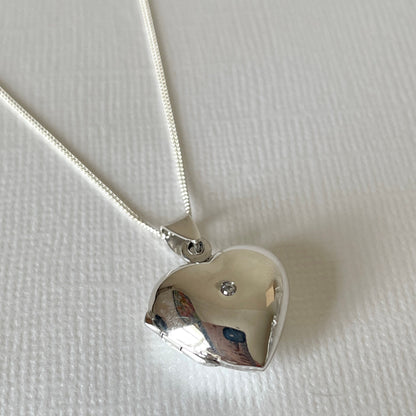 Sterling silver heart locket with cubic zircona stone